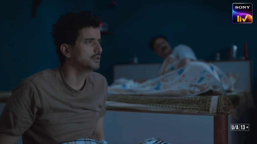 Annu Mishra played by Anant V Joshi sitting on bed in a night scene from Gullak Season 5 SonyLIV