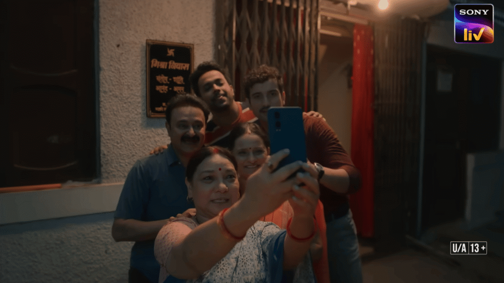 The complete Mishra family taking a selfie outside Mishra Niwas in Gullak Season 5 SonyLIV 2026
