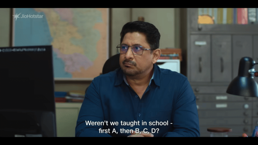 Arshad Warsi as Inspector Pedro Gonsalves in an office scene from Pritam and Pedro web series on JioHotstar 2026
