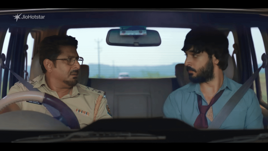 Arshad Warsi as Inspector Pedro Gonsalves and Vir Hirani as Pritam sitting together in a police jeep in Pritam and Pedro JioHotstar 2026