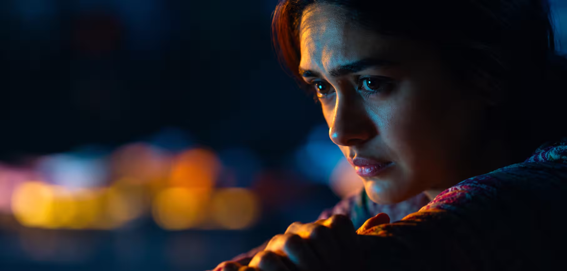 Mrunal Thakur as Pooja in a dramatic close-up scene from Pooja Meri Jaan.